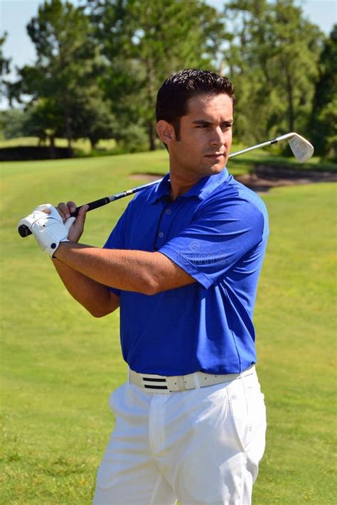 Male Golfer Poses With Golf Club Stock Photo Image Of Hits Ball