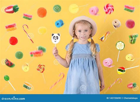 Little Girl With Candy On Color Background Stock Photo Image Of