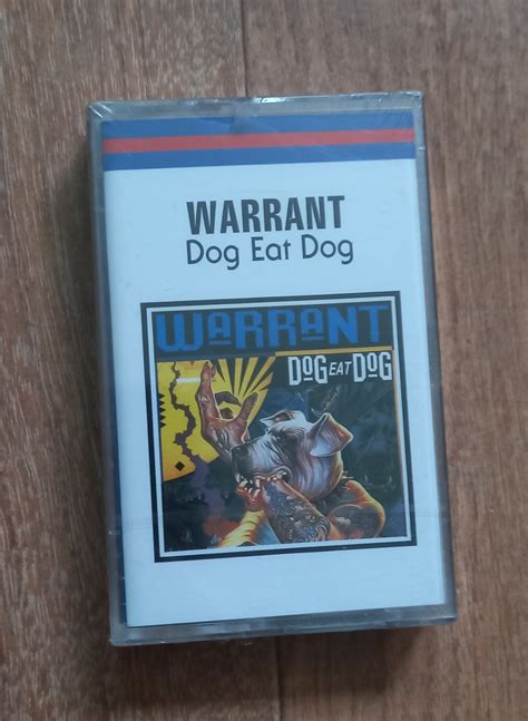 Warrant Dog Eat Dog Cassette Photo Metal Kingdom