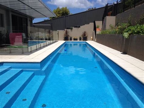 A Compass Pools 123m Fastlane Pool In Sapphire From The Bi Luminite Range Of Colours Backyard