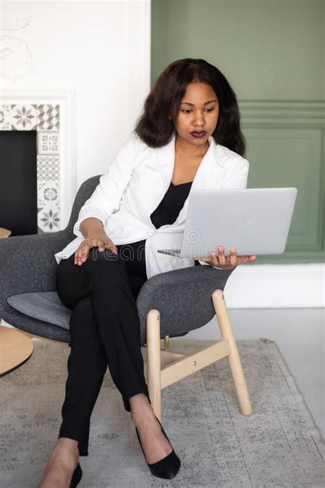 Female Entrepreneur Cheerful African American Businesswoman Working On