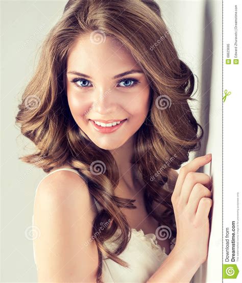 Smiling Beautiful Girl Brown Hair With An Elegant Hairstyle Hair