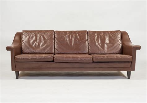 Fjords 855 loen large leather recliner norwegian ergonomic scandinavian lounge reclining chair furniture nordic line genuine havana dark brown leather espresso wood. Danish Architectural brown leather sofa, 1960's | #120352