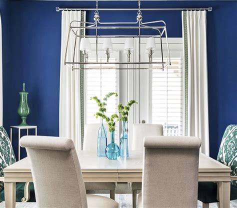 A good rule of thumb for dining room chandeliers is to hang them so that the bottom of the chandelier will hang 30 inches to 36 inches above the table. Polished Nickel Linear Chandelier in Dining Room | Linear ...