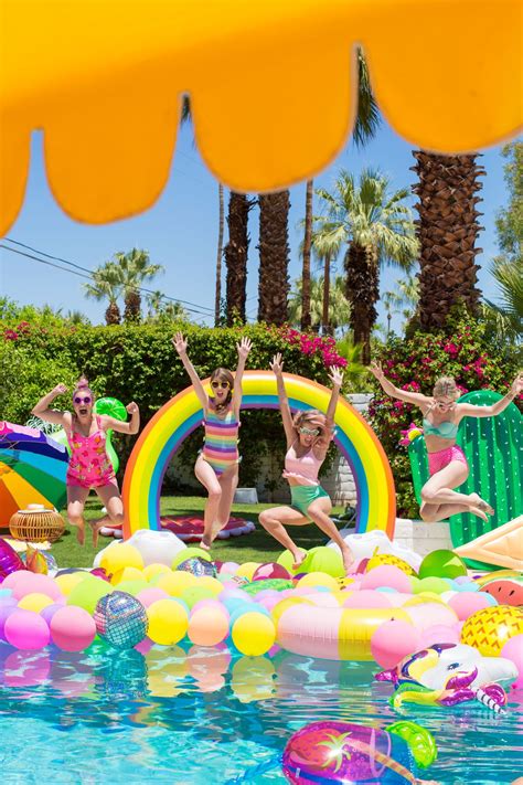 An Epic Rainbow Balloon Pool Party Pool Birthday Party Girls Pool Parties Pool Party