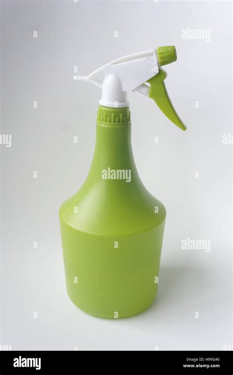 A Green Spray Bottle Stock Photo Alamy