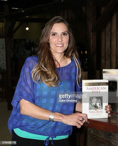 Author Taya Kyle Holds Up Her Book American Wife Love War Faith News Photo Getty Images