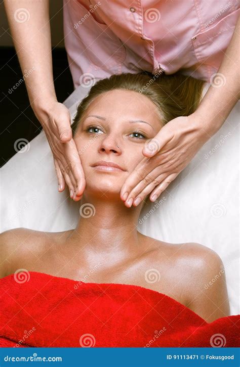 Young Woman Receiving Face Massage In The Beauty Clinic Stock Image Image Of Female Girl