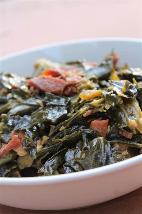 These soul food style collard greens are packed with flavor, accented with bacon for an extra savory touch. Soul Food Collard Greens - I Heart Recipes