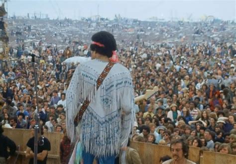 Jimi Hendrix Performing To A Huge Outdoor Crowd At The Music Festival