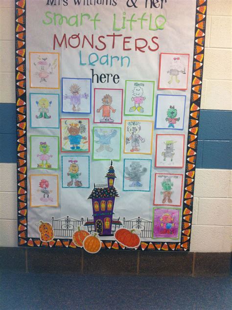 A Bulletin Board With Pictures Of Monsters And Pumpkins In Front Of The