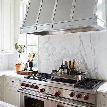 Kitchen backsplash is no more a protective element. Faux Marble Slab Backsplash