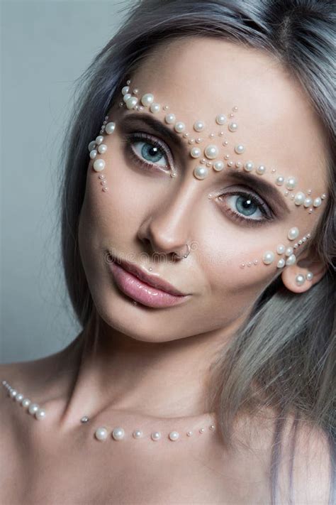Beautiful Young Woman Portrait With Pearl Jewellery And Make Up Stock