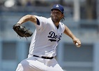 Los Angeles Dodgers starting pitcher Clayton Kershaw throws to the ...