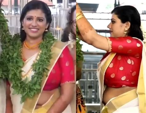 sexy malayali bride very huge boobs and big deep navel hole in kerala saree