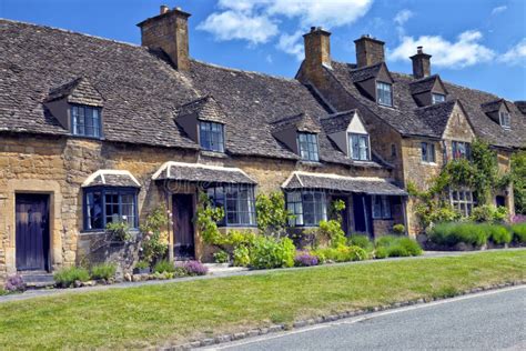 Stone Cottages In Rural English Village By A Road Stock Photo Image