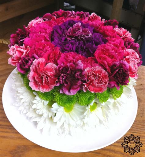 Flowers should be picked in the early morning. Woods Flowers: Temple, Texas A fun "Cake" arrangement for ...