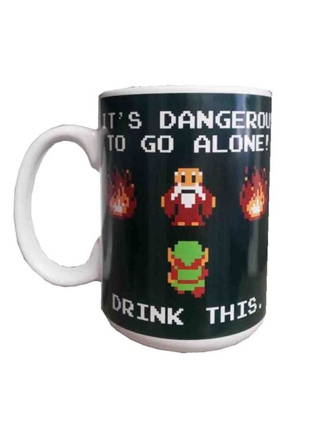 Legend Of Zelda Nintendo Coffee Mug 15 Oz Its Dangerous To Go Alone