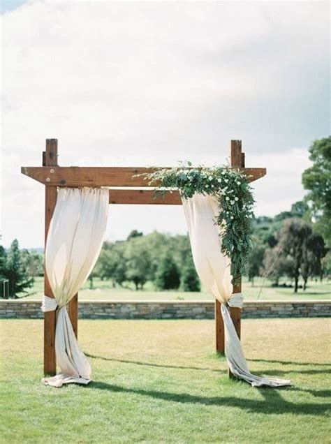 20 Wedding Arches With Drapery Fabric Oh The Wedding Day