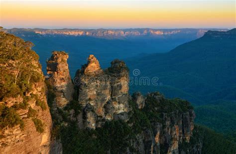 Beautiful Golden Sunset Over The Three Sisters Rock Formation In The