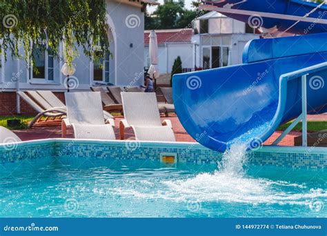 Water Fun In The Pool Slide Concept Cheerful Perky Bright Colorful