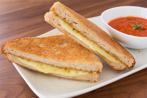 It's possible that a cat can be lactose intolerant so introduce it slowly or baked into treats in small amounts. Grilled Cheese Sandwich Recipe | Fresh Tastes Blog | PBS Food