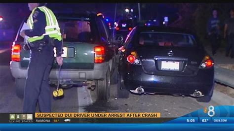 suspected drunk driver under arrest after crash