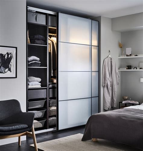 Maximise your wardrobe storage by choosing the komplement accessories that suit you. PAX / SVARTISDAL Wardrobe combination - black-brown, white ...