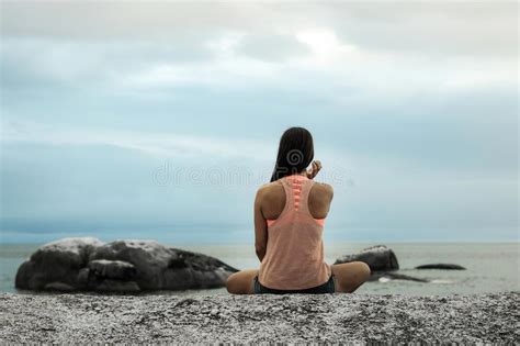 Woman Sitting On A Rock At Sunset On Bakovern Beach Cape Town Stock Image Image Of Lady