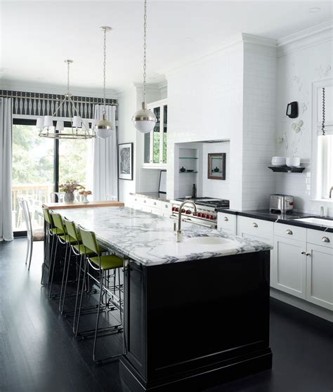 Black Island In White Kitchen Black Wood Flooring Marble Counter Top