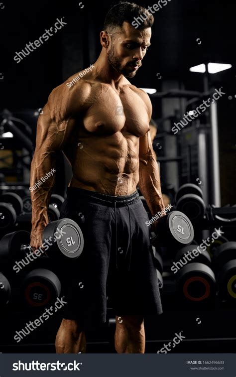 Portrait Shirtless Tensed Male Bodybuilder Holding Stock Photo Edit