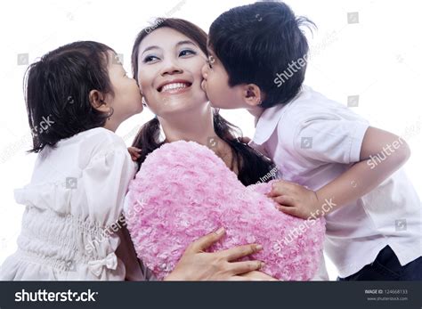 Happy Mother Kissed By Her Daughter Stock Photo 124668133 Shutterstock