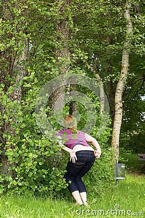 Woman Is Peeing In The Nature Stock Photo Image