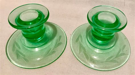 green depression glass candlestick holders set of two