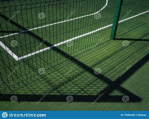 Basketball Court Without People Bright Sun And Dense Shadows On The