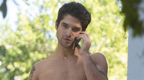 Tyler Posey Goes Shirtless As He Works On His Motorcycle Shirtless