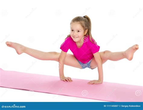 The Gymnast Perform An Acrobatic Element On The Floor Stock Image