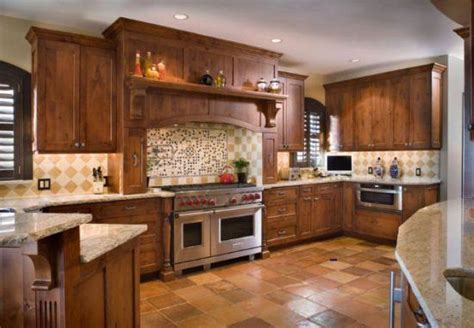 After the cabinet has dried, use 220 grit sandpaper to sand the back panels of the cabinet. Out Of Curiosity:: Painted Or Stained Kitchen Cabinets? | Hickory cabinets and Kitchen photos
