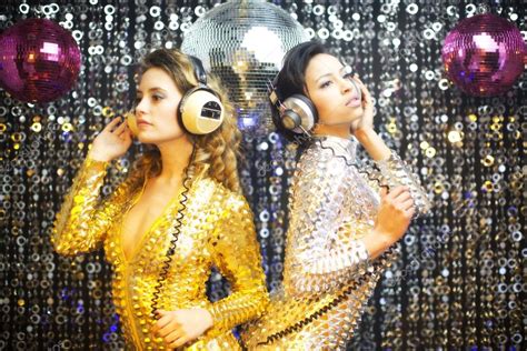 Two Beautiful Sexy Disco Women In Gold And Silver Catsuits Danci Stock Photo By Dubassy