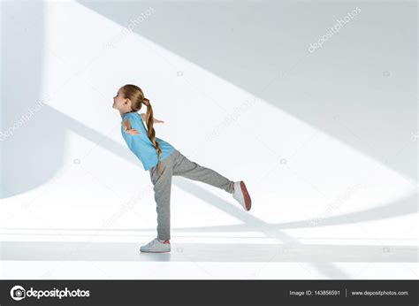 Little Girl Exercising — Stock Photo © Igortishenko 143856591