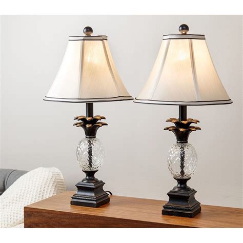 Convenient rotary feed through switch. Alexandra Antiqued Bronze Pineapple 23.5-inch Table Lamps ...