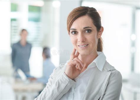 confident woman entrepreneur posing in her office stock image image of posing confident 74205829