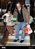 Cold Souls' star Paul Giamatti, carrying luggage and food from Sbarro ...