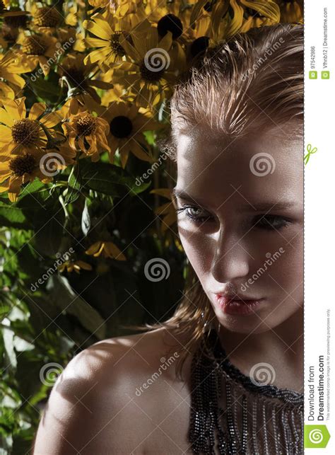 Portrait Of A Young Girl With Flowers Stock Photo Image Of Foliage