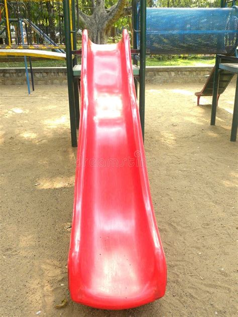 Red Color Slide At Children`s Playground Stock Photo Image Of