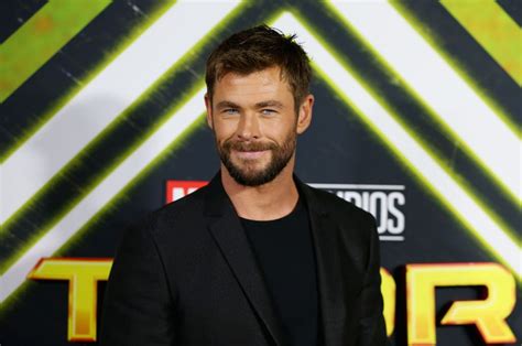 Chris Hemsworth Is Showing Men The Secret To Dressing Down A Black Suit