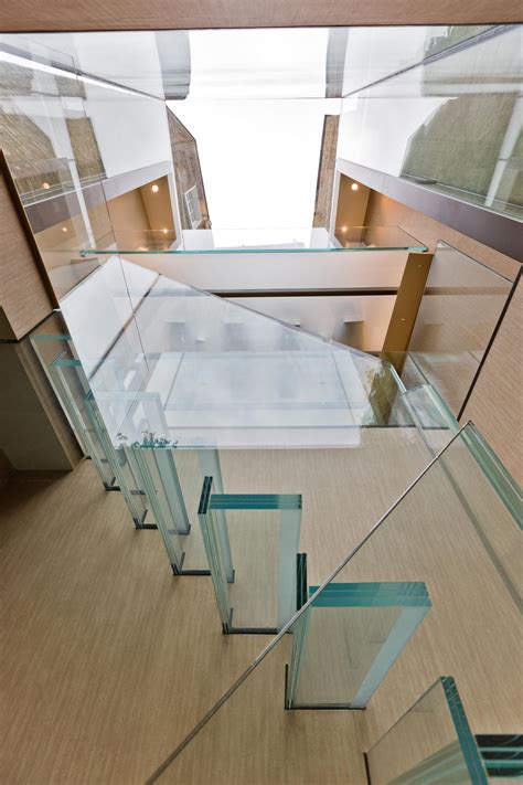 Frameless Cantilevered Glass Staircase With Laminated Treads Risers