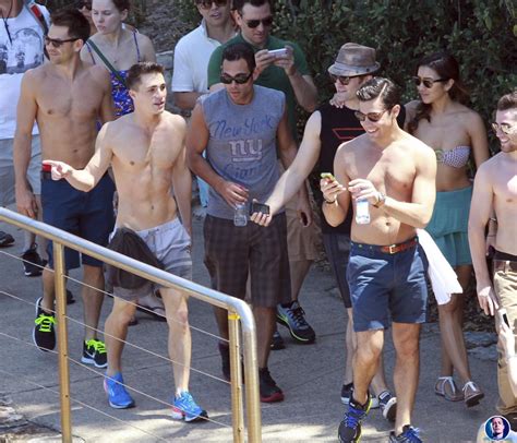 hot guys colton haynes looking sexy shirtless on the beach with equally sexy guy friends yum