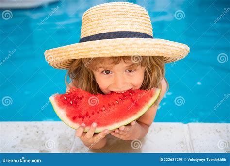 Funny Amazed Child Eats Watermelon Near The Pool Stock Photo Image