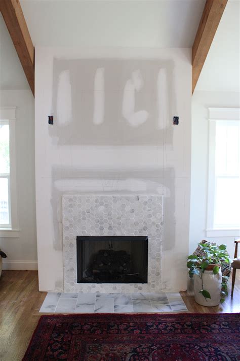 Tile around fireplace fireplace tile surround fireplace update brick fireplace makeover fireplace remodel diy fireplace living room with fireplace fireplace surrounds fireplace design add style to your fireplace with elongated hex tile america brings you the stunning tile collection from our partners onyx france. DIY Faux Fireplace Surround - thewhitebuffalostylingco.com